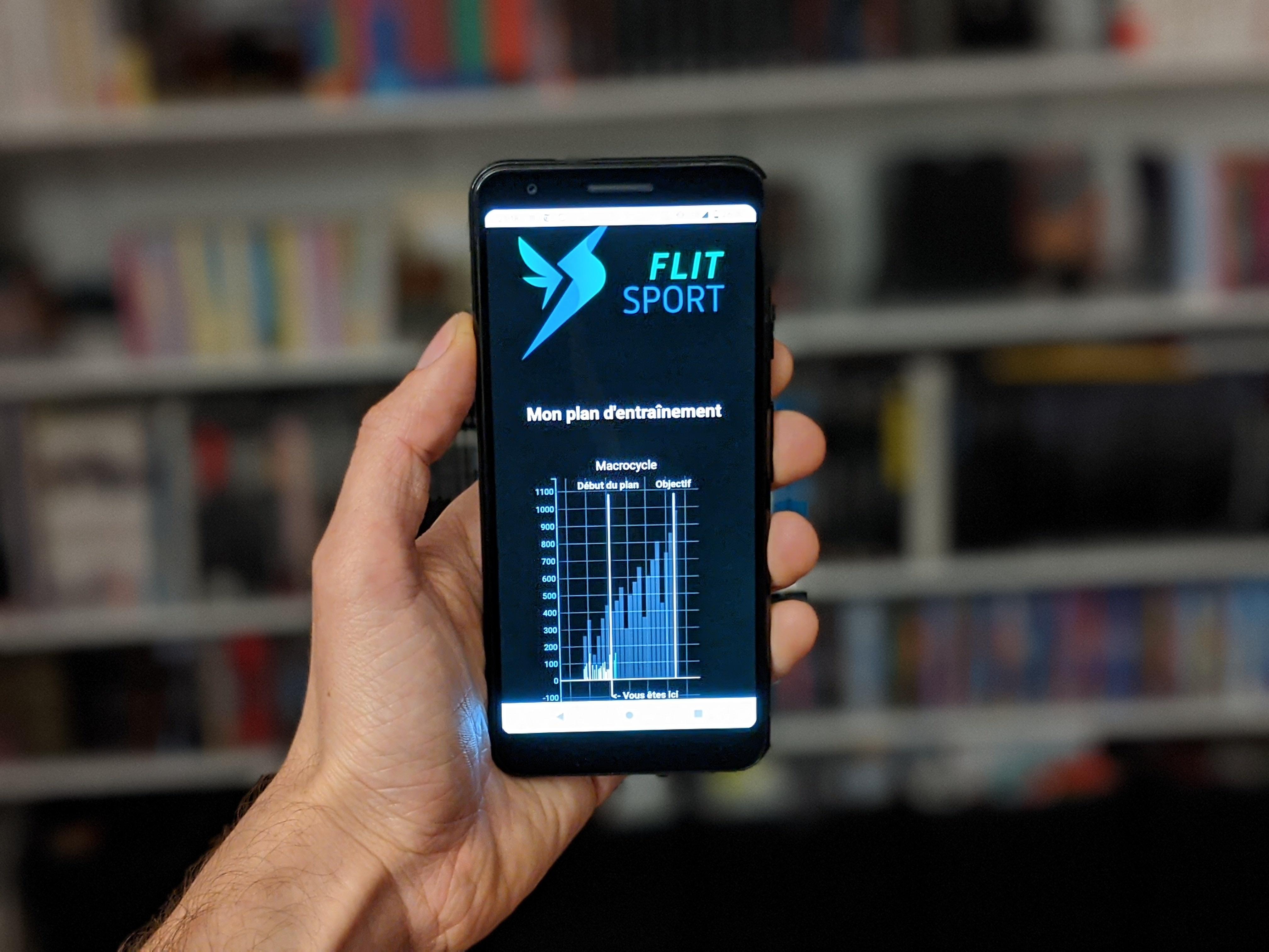 Smartphone qui affiche l'application Flit Sport